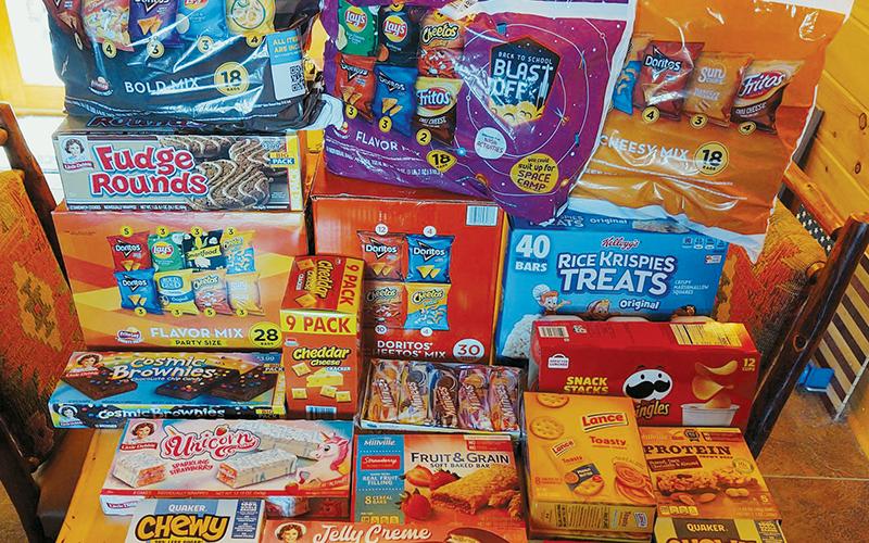 Community support has been plentiful for the Robbinsville band program, including the Lady Dragons’ annual “Christmas in July” event Saturday in Fontana Dam yielding these snacks for band camp this week. Photo by Deborah Cheney/Contributing Photographer