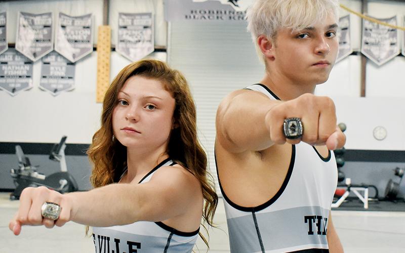 For the first time in North Carolina history, a pair of siblings have won an individual state championship in both the same sport and the same calendar year. Robbinsville’s Aynsley and Kyle Fink reached the pinnacle in wrestling this season. Photos by Kevin Hensley/sports@grahamstar.com