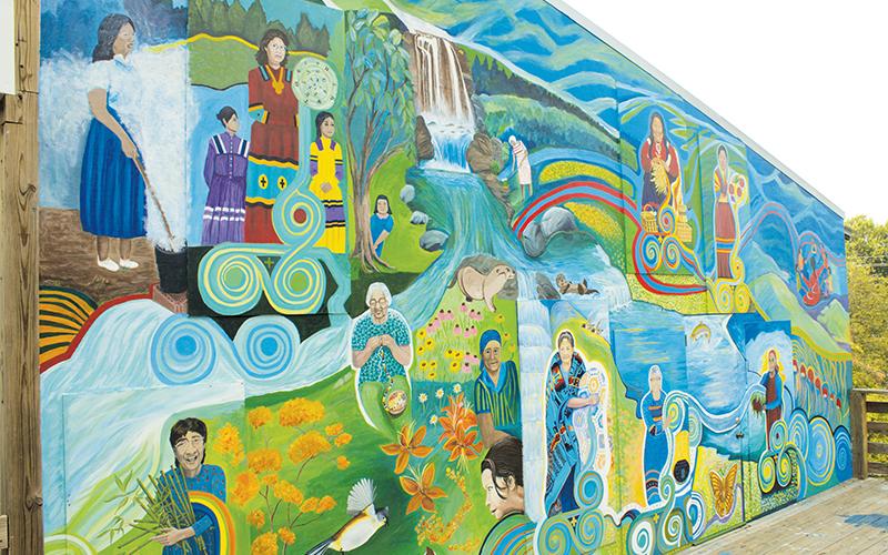 A mural in downtown Robbinsville – depicting matriarchs of the  Snowbird Community – was dedicated in a ceremony Saturday. Photos by Charlie Benton/news@grahamstar.com