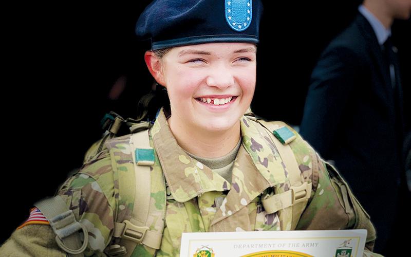 Robbinsville High School senior Ainslee Munro proudly displays her diploma from the U.S. Army Military Police School, after completing two months of National Guard basic training on Aug. 19.