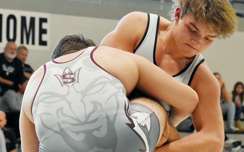 Two-time defending 195-pound 1A state champion Kyle Fink prepares for a takedown during Saturday’s  inaugural “Nothing but Neutral” tournament at  Robbinsville High School. Photos by Kevin Hensley/sports@grahamstar.com