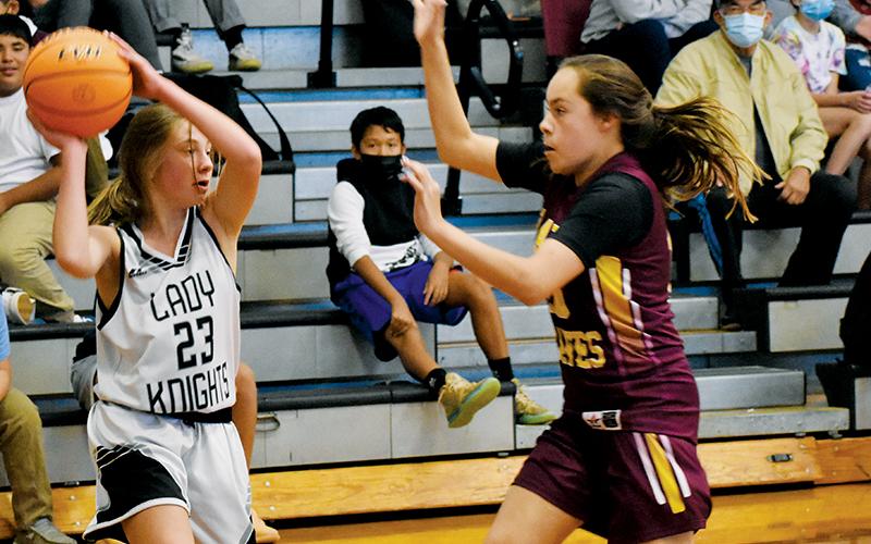 Abby Wehr searches for an open option during Monday’s season opener against Cherokee. Photos by Kevin Hensley/sports@grahamstar.com