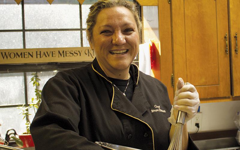 Willow Tree Catering and Baking owner and Chef Shea Blalock Anderson in the  kitchen of her restaurant. Anderson emphasized that cooking with love was an  important part of preparing a Holiday meal. Photo by Charlie Benton/news@grahamstar.com