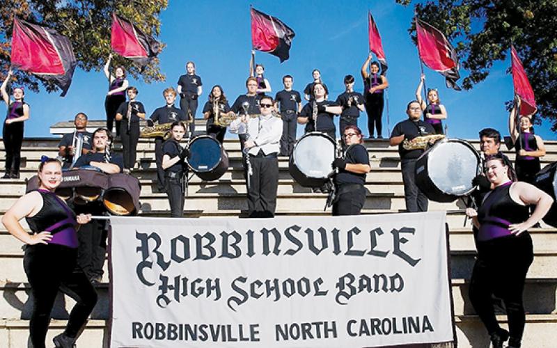 The Black Knight Band is finishing its first marching season under the leadership of alumna Amber Watkins. Photo courtesy of Maria Shook Photography