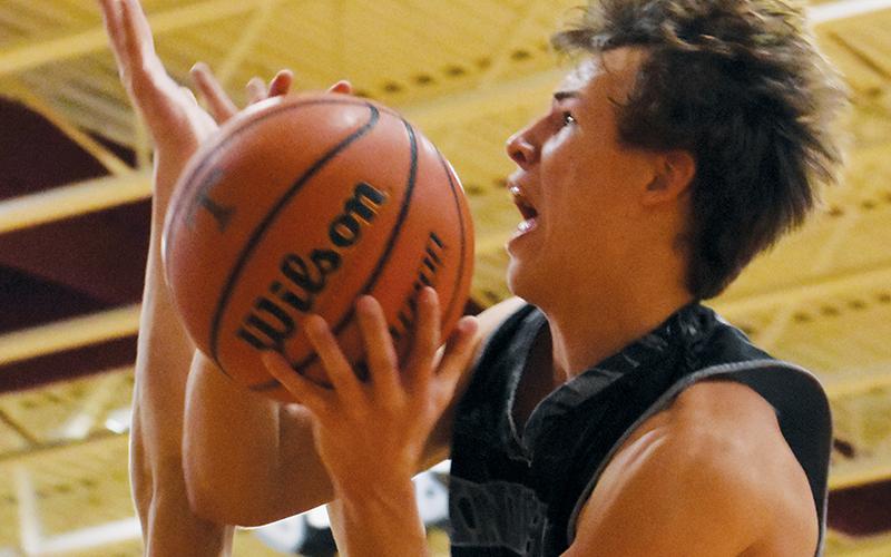 Robbinsville point guard Brock Adams takes flight during Tuesday’s 55-52 road loss to Tellico Plains. Photo by Kevin Hensley/sports@grahamstar.com