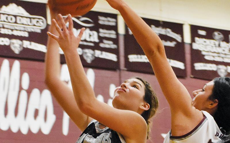 Lady Knights senior Yeika Jimenez (20) drives for a second-half basket Tuesday at Tellico Plains.