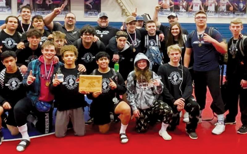 Members of the Robbinsville wrestling program pause after winning the 2021 Falcon Frenzy in Hendersonville. Photo courtesy of Susan Crowe