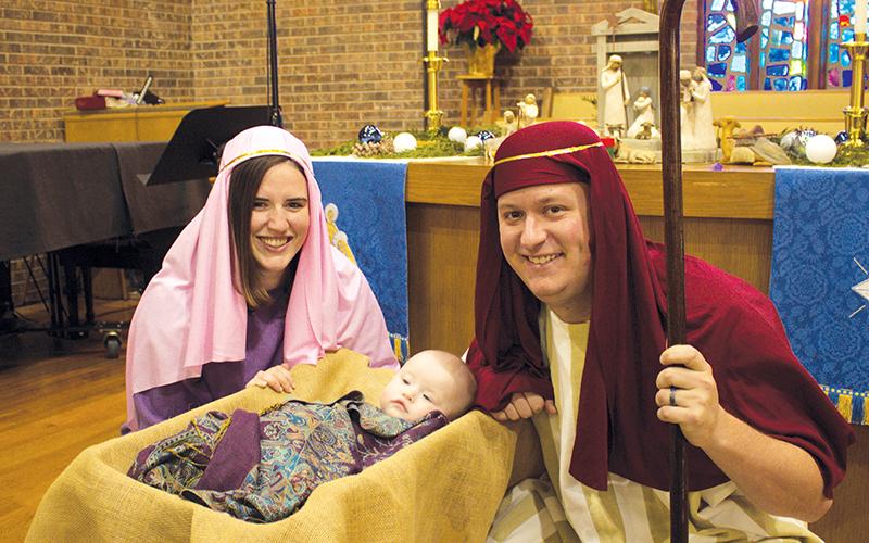 Kelsey Cody (Mary), 7-month-old Nora Grace Cody (Jesus) and Brady Cody (Joseph) as the Holy Family, which will be a part of Robbinsville United Methodist Church’s first-ever Christmas Extravaganza on Sunday. Photo by Charlie Benton/news@grahamstar.com