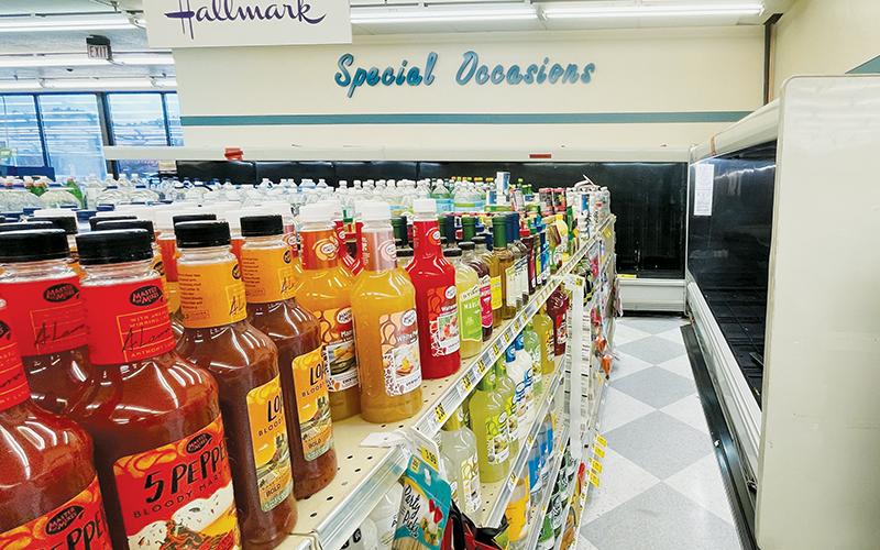 Ingredients for mixed drinks at the Robbinsville Ingles will soon be conjoined with beer and wine, available for purchase in the coolers at the end of the aisle. Photo by Randy Foster/news@grahamstar.com