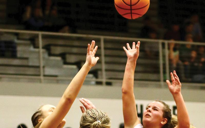 Desta Trammell airs out an inside shot Friday against Robbinsville. The junior point guard put up 25 against the Lady Jackets, surpassing the 900-point career threshold in the Lady Knights’ 64-38 win. Photo by Miranda Buchanan/Robbinsville High School Yearbook