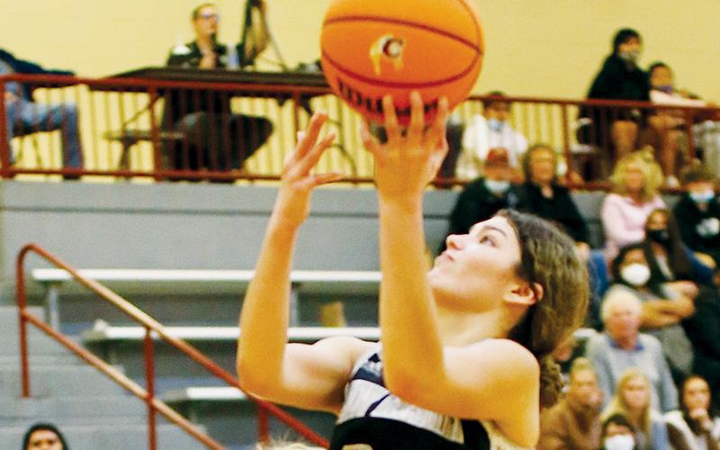 Lady Knights senior Yeika Jimenez drives past Cherokee’s Erin Rogers for a second-half basket on Jan. 13. Photo by Miranda Buchanan/Robbinsville High School Yearbook
