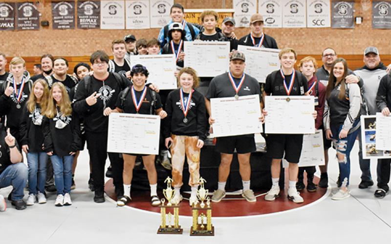 For the sixth year in a row, Robbinsville has conquered the Smoky Mountain Conference. The Knights gathered at center mat following the divisional tournament Saturday at Swain County, to relish in the accomplishments. Photos by Kevin Hensley/sports@grahamstar.com