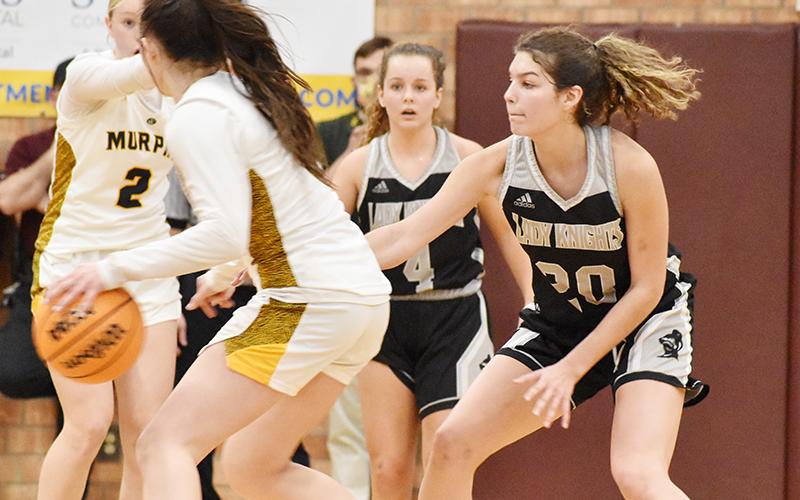 Robbinsville senior Yeika Jimenez guards Murphy's Addie Johnson during Friday's Smoky Mountain Conference Tournament finals at Swain County High School. Photo by Kevin Hensley/sports@grahamstar.com