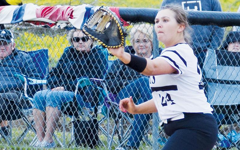 Robbinsville’s Ivy Odom reaches for the catch  during the first round of the state playoffs against South Stokes on May 5. Odom is one of eight Lady Knights returning for their senior season.