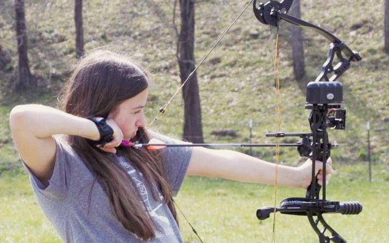 Robbinsville Middle School’s Myley Hyde takes aim during Saturday’s archery competition at the MidWest Tournament in Cruso. Photo by Cheri Lynn/Robbinsville Shooting Team