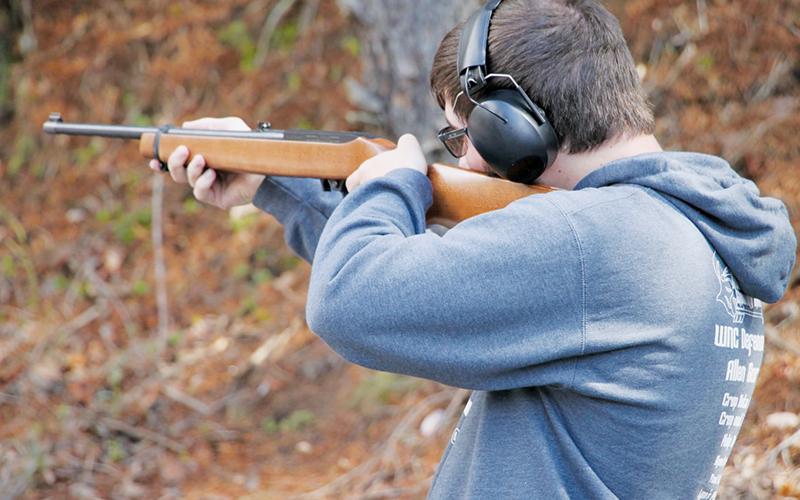 Robbinsville’s Will Crisp competes in the rifle competition at Saturday’s District 9 Tournament. Photo courtesy of Cheri Lynn/Robbinsville Shooting Team