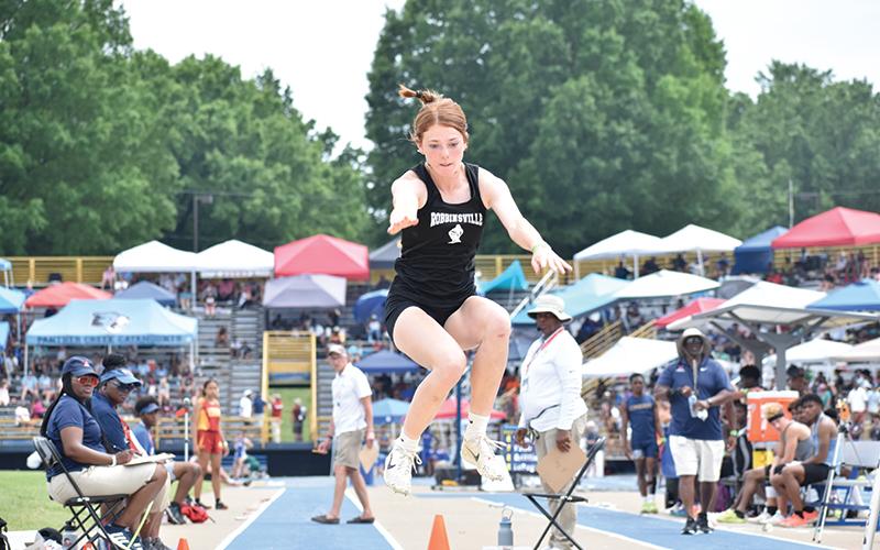 Robbinsville sophomore Zoie Shuler broke the 1A state record in the triple jump Saturday, capturing her second state championship of the afternoon in the process. Photos by Kevin Hensley/sports@grahamstar.com
