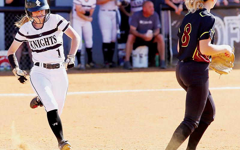 Senior Brook Turpin (left) beats out a play at first during Tuesday’s loss to South Stokes. Photo courtesy of Miranda Buchanan/Robbinsville High School Yearbook
