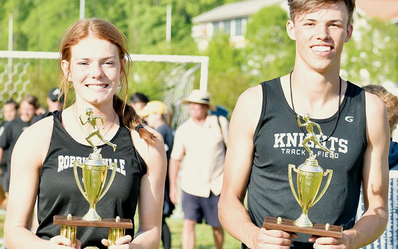 Zoie Shuler (left) and Brock Adams were named the respective Smoky Mountain Conference Most Outstanding Track and Field Girls and Boys Athlete at the conclusion of May 4’s championship meet in Cherokee. Photos by Kevin Hensley/sports@grahamstar.com