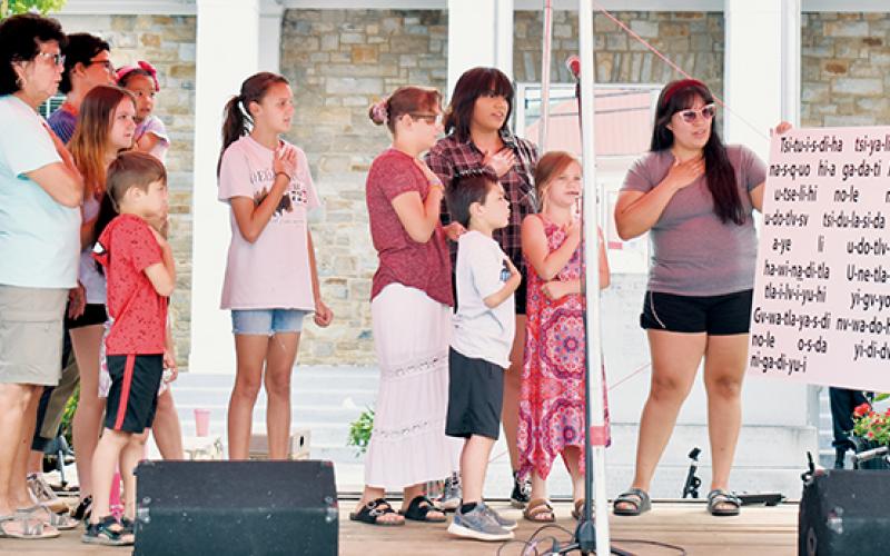 Cherokee Language Summer Course students recite the Pledge of Allegiance Saturday at the Graham County Heritage Festival. Photos by Kevin Hensley/editor@grahamstar.com