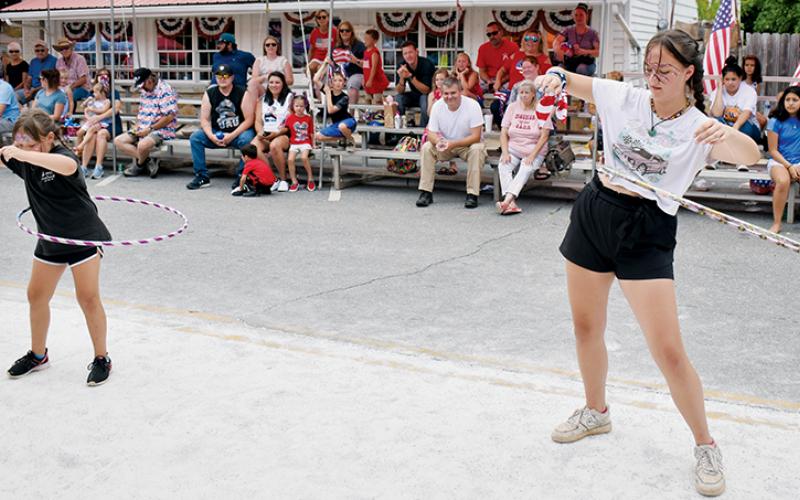 The Hula-hoop competition at the festival came down to a pair of Pike County, Ga., siblings. In the end, Miranda (right) McIntyre outlasted her younger sister Maylee to win it all. Other children’s activities included an egg and spoon race, as well as a limbo competition.