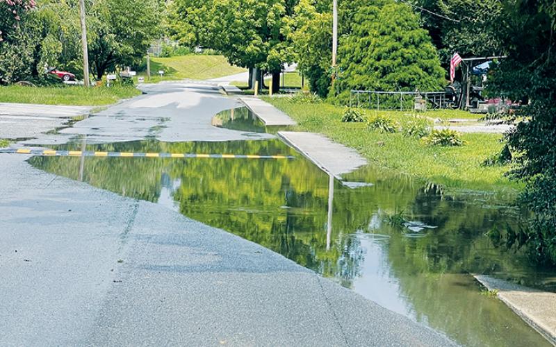 The Town of Robbinsville is looking to apply for a grant to pay for a stormwater management master plan, which can be used to guide infrastructure improvements to avoid localized flooding – such as this situation on Ford Street following heavy rains two weeks ago. Photo by Randy Foster/news@grahamstar.com