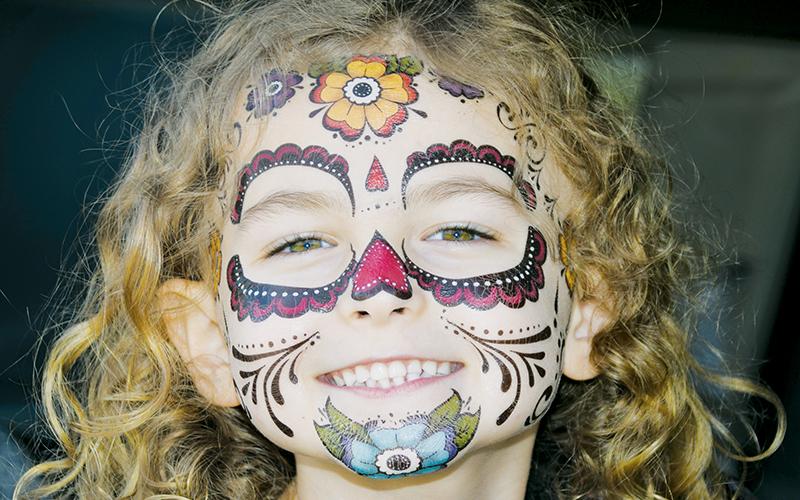 Alyssa Monroe’s detailed facepaint was a hit at the Oct. 31, 2020 Robbinsville High School Trunk-or-Treat. Her cheerful demeanor was enough to convince judges of the 2021 N.C. Press Association News, Editorial and Photojournalism contest that former Graham Star staff photographer Art Miller should receive first place in the Photography, General News competition for capturing Monroe in the moment. Photo by Art Miller/The Graham Star