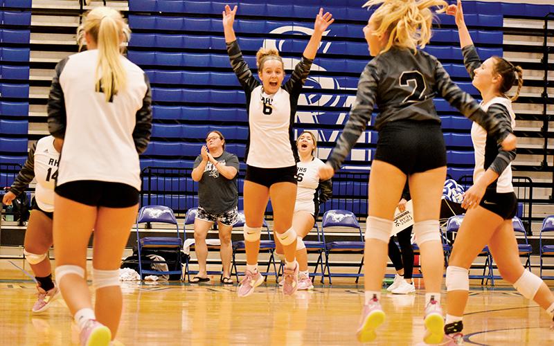 Robbinsville senior Desta Trammell (6) could not contain her excitement after the final point of the Lady Knights’ 4-set victory at Smoky Mountain on Monday. Also soaking up the moment was Tai Owle (14), Kensley Phillips (4), assistant coach Dede Brooms, Aubrie Wachacha (16), Suri Watty (2) and Delaney Brooms. Photos by Kevin Hensley/sports@grahamstar.com