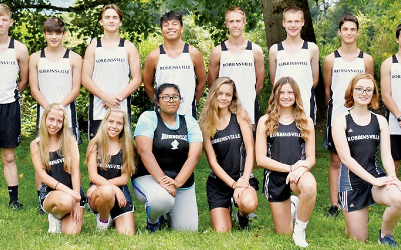 The 2022 Robbinsville varsity cross country team. Names are listed from left in both rows. Front: Skyler Oliver, Kamree Oliver, Jennifer Guzman, Liberty Hartley, Abby Wehr and Elizabeth Boyle. Back: Ethan Webster, Skyler Anderson, Bruce Helms, Xander Wachacha, William Cable, Zeb Stewart, Albert Avella and Braxton Hicks. Not pictured is head coach Kaitlyn Carringer-Adams. Photo by Kevin Hensley/sports@grahamstar.com