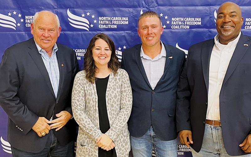 The Rev. Coy Adams (second from right) began the effort to bring the coalition to Graham County during the  summer. Pictured are Phillip Fulmer, Brandi Adams, Coy and N.C. Lt. Gov. Mark Robinson.