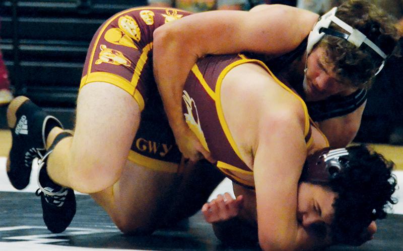 Kage Williams maintains top control over Cherokee’s Vincent Owle during a Nov. 15 dual. A two-time state  champion, Williams won the 195-pound bracket at Saturday’s Dekota Smith Invitational. Photo by Kevin Hensley/sports@grahamstar.com