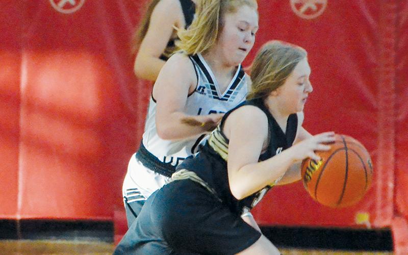Novie Dutcher applies some heavy perimeter pressure during Nov. 17’s tilt with Hayesville.