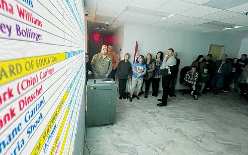 Anywhere between 30-40 candidates and voters crammed into the new Graham County Board of Elections office with serious interest Nov. 8, as results trickled in for the 2022 general election. Photo by Randy Foster/news@grahamstar.com