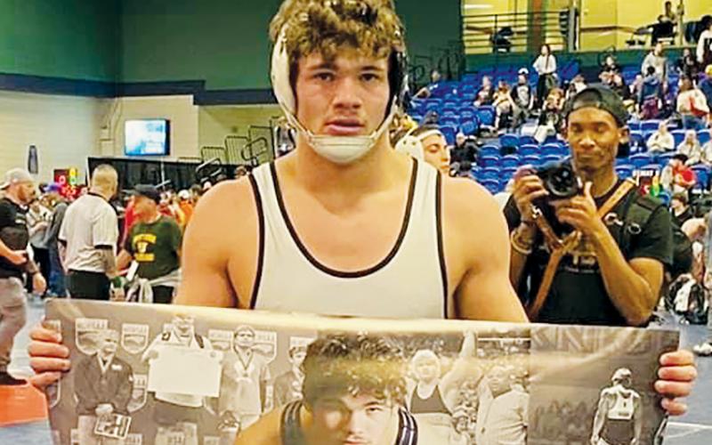 Robbinsville junior Kage Williams picked up his 100th career win on Dec. 29 during the Holy Angels Invitational in Greensboro.