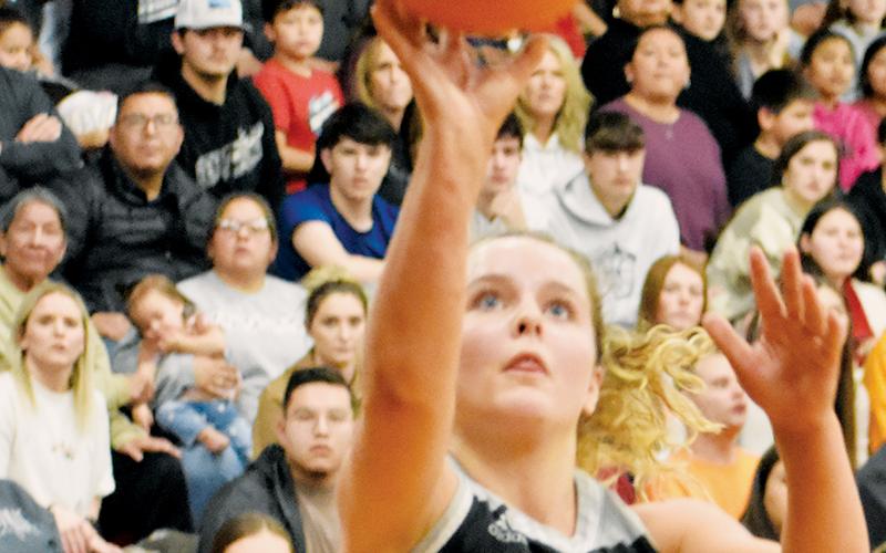 Lady Knights senior Desta Trammell shoves the ball toward the net on a breakaway in Friday’s Smoky Mountain Conference Tournament finals. Kevin Hensley/sports@grahamstar.com