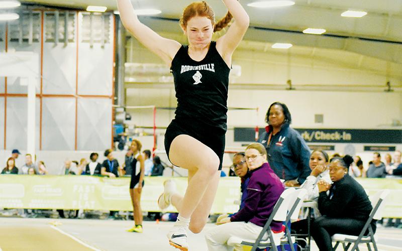 Lady Knights junior Zoie Shuler leapt to a pair of 1A indoor-track state titles Saturday, collecting gold in both the long and triple jumps. Photos by Kevin Hensley/sports@grahamstar.com
