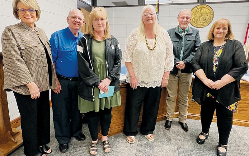 At the outset of Tuesday’s meeting, the Graham County Board of Education recognized Susie Beasley, who retired after 30 years of service to local schools. From left are school board member Pam Knott, board Chair Rodney Nelson, Beasley, school board members Debra Dinschel and Chip Carringer, and Superintendent Angie Knight. Photo by Kevin Hensley/editor@grahamstar.com