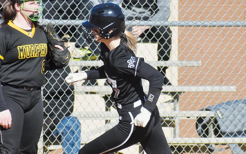 Robbinsville sophomore Claire Barlow rounds the first-base bag during Tuesday’s 16-11 win at Murphy. Photo by Justin Fitzgerald/Cherokee Scout