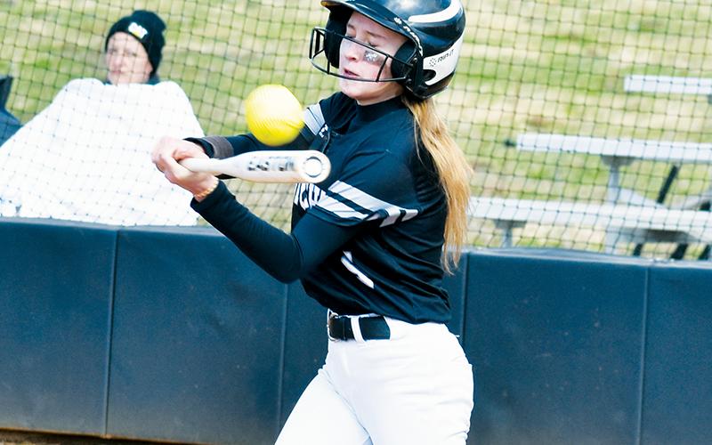 Khaygen Buchanan unleashes a hit for the middle school Lady Knights against Murphy on March 14. Photo by Kevin Hensley/sports@grahamstar.com