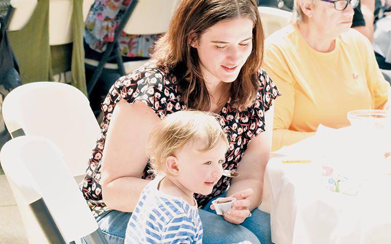 Nora Grace Cody, 22 months old, was ecstatic to try some of the chocolate available for sampling at Saturday’s SpringFest. Nora is the daughter of Brady and Kelsey Cody – and the hometown dentist (Kelsey) was willing to look past any cavity concerns for Nora’s enjoyment of the proceedings.