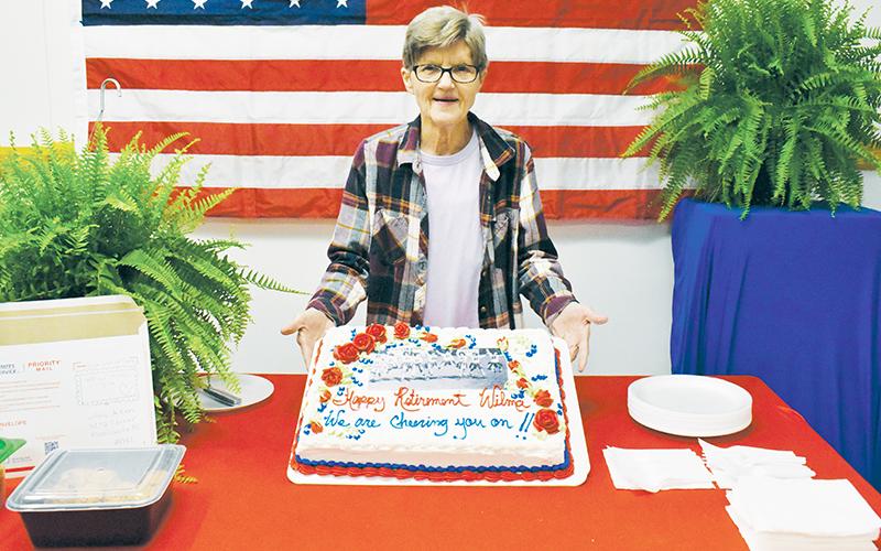 After 24 years of service, Wilma Carver Aiken clocked out at the Robbinsville Post Office for the last time Monday. A member of her family has worked the same route in Graham County since the 1940s. Photo by Kevin Hensley/editor@grahamstar.com