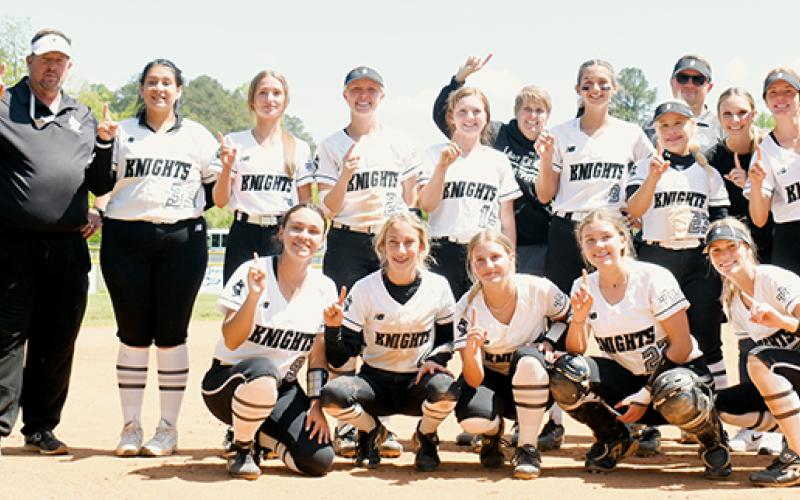 The Robbinsville Lady Knights relish in the moment after winning their 14th Smoky Mountain Conference title Saturday at Hiwassee Dam. Photo by Kevin Hensley/sports@grahamstar.com