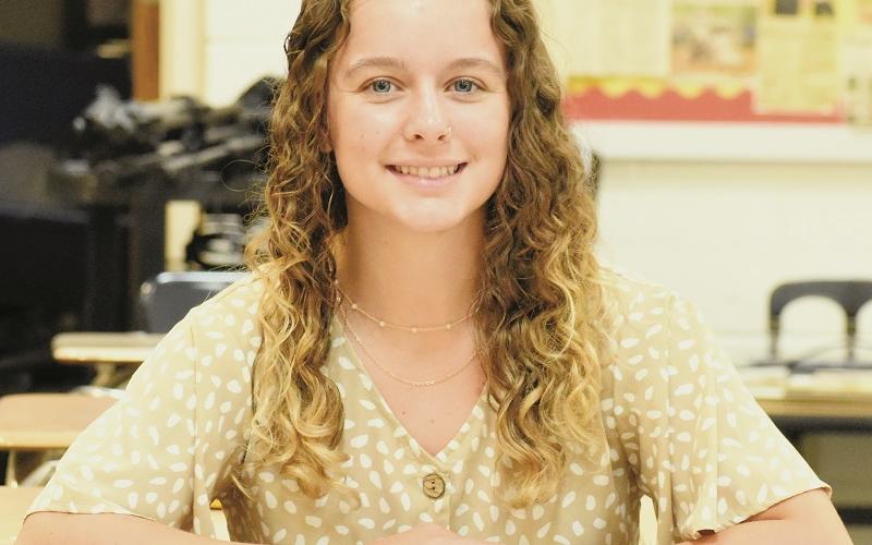 Salutatorian Desta Trammell has made an art out of juggling her schedule, both in the classroom and in the field of athletics.