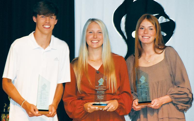 Brock Adams, Kensley Phillips and Zoie Shuler (from left) each received the prestigious Ed Jackson Award for being Robbinsville's Most Valuable male and female athletes at May 22's R-Club Banquet. Photos by Kevin Hensley/sports@grahamstar.com