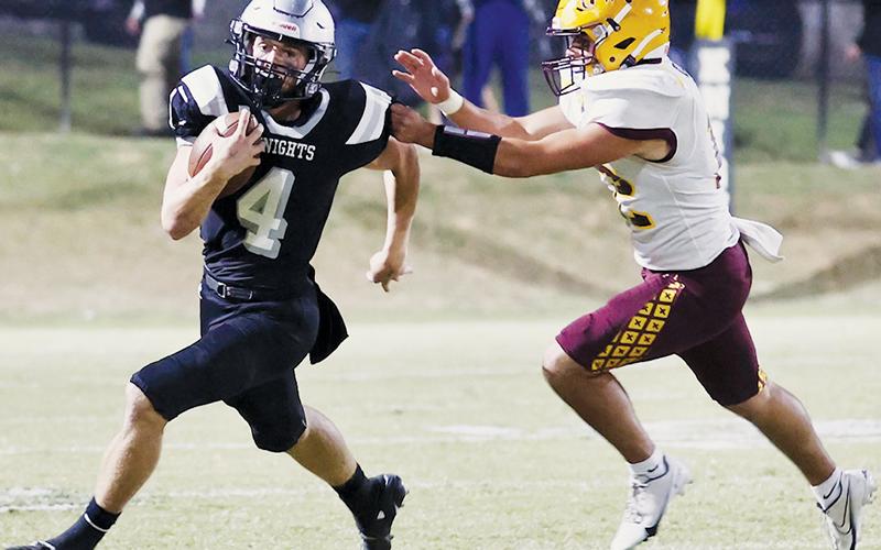 Cuttler Adams evades capture during Oct. 7, 2022’s home game against Cherokee.