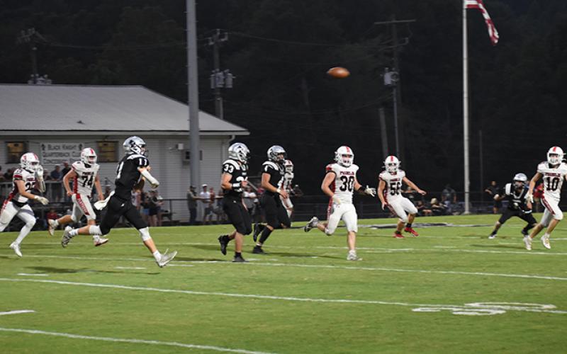 Donovan Carpenter unleashes a pass during the first half of Friday's 26-0 rout over Franklin. Photo by Danielle Crabtree/The Graham Star