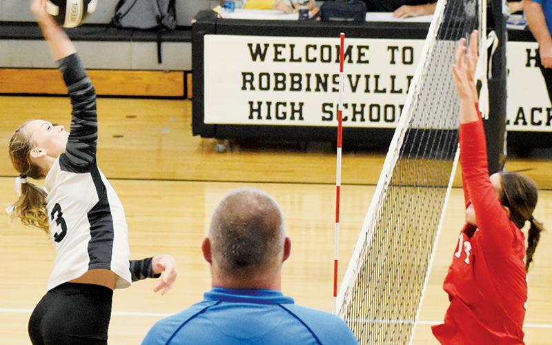 With Franklin’s Cali Queen lining up for the block, Claire Barlow begins her delivery in Robbinsville’s 3-1 loss to the Panthers on Monday.