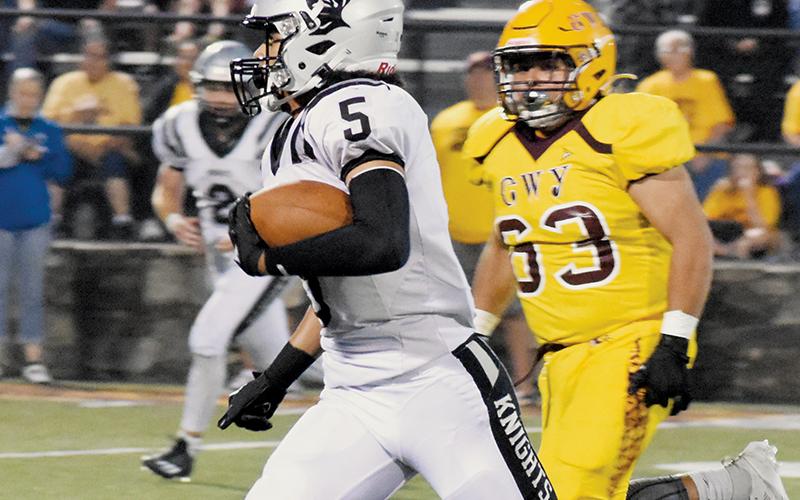 Robbinsville’s Darion Ledbetter dashes upfield after picking off a first-quarter pass at Cherokee on Friday. Along with Cuttler Adams, Ledbetter has a team-high three interceptions this season.