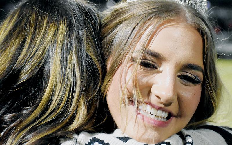 After reaching the home sideline of Bob Colvin Field on Friday, Taelyr Jackson almost immediately fell into an embrace with her mother Robyn Wolfe. Photo by Kevin Hensley/editor@grahamstar.com