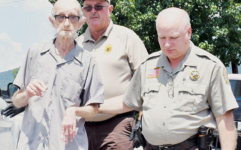 It has been over five years since Graham County Sheriff’s Office personnel Edward Cable (center) and Jerry Crisp escorted Garrel Alvah Orr out of the Graham County Courthouse after being charged with first-degree murder in connection with the death of his daughter-in-law Lora Orr. Monday, Garrel pleaded guilty to voluntary manslaughter.